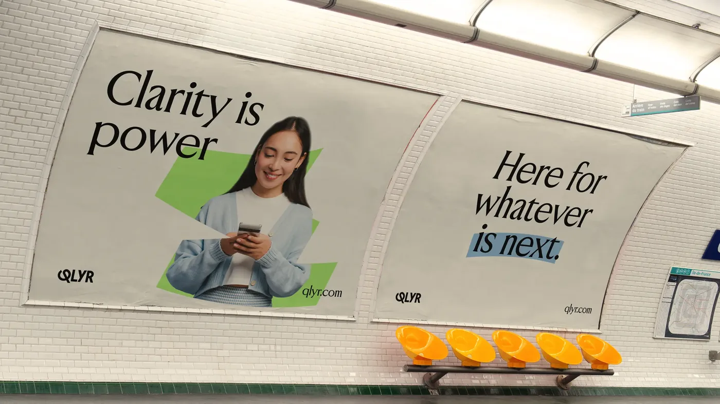 QLYR campaign artwork in a public poster presentation