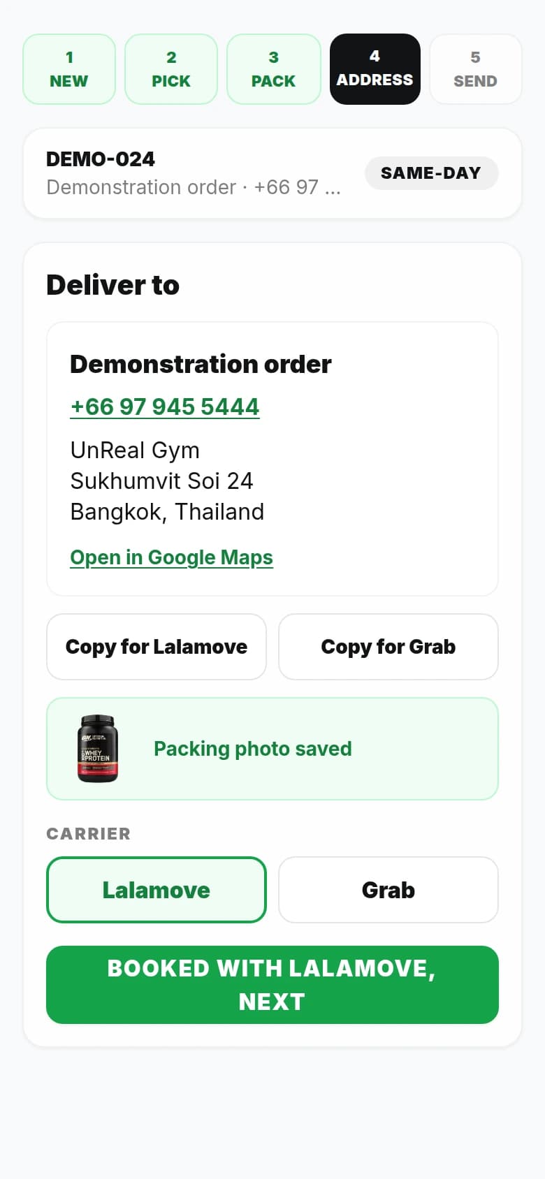 UnReal dispatch screen with delivery address, Copy for Lalamove and Copy for Grab controls and carrier selection