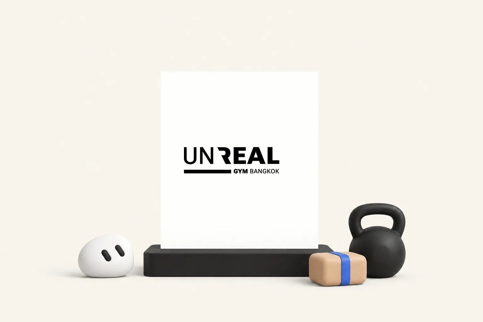 UnReal Gym brand composition with kettlebell and parcel