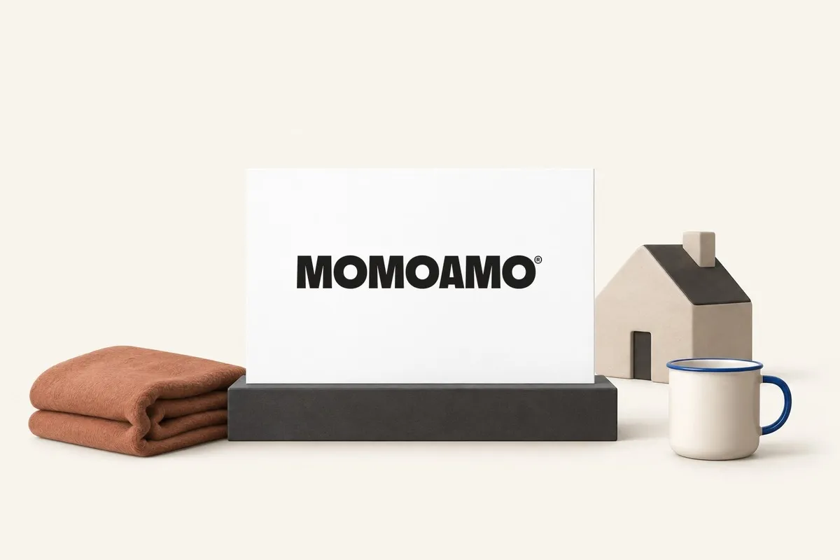Momoamo retreat brand with a house, blanket and cup