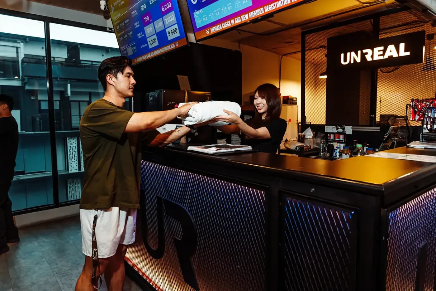 The front desk at UnReal Gym in Bangkok